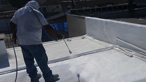 Spraying white top coat